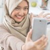 Portrait,Of,A,Woman,With,Hijab,Taking,Selfie,Using,Smart
